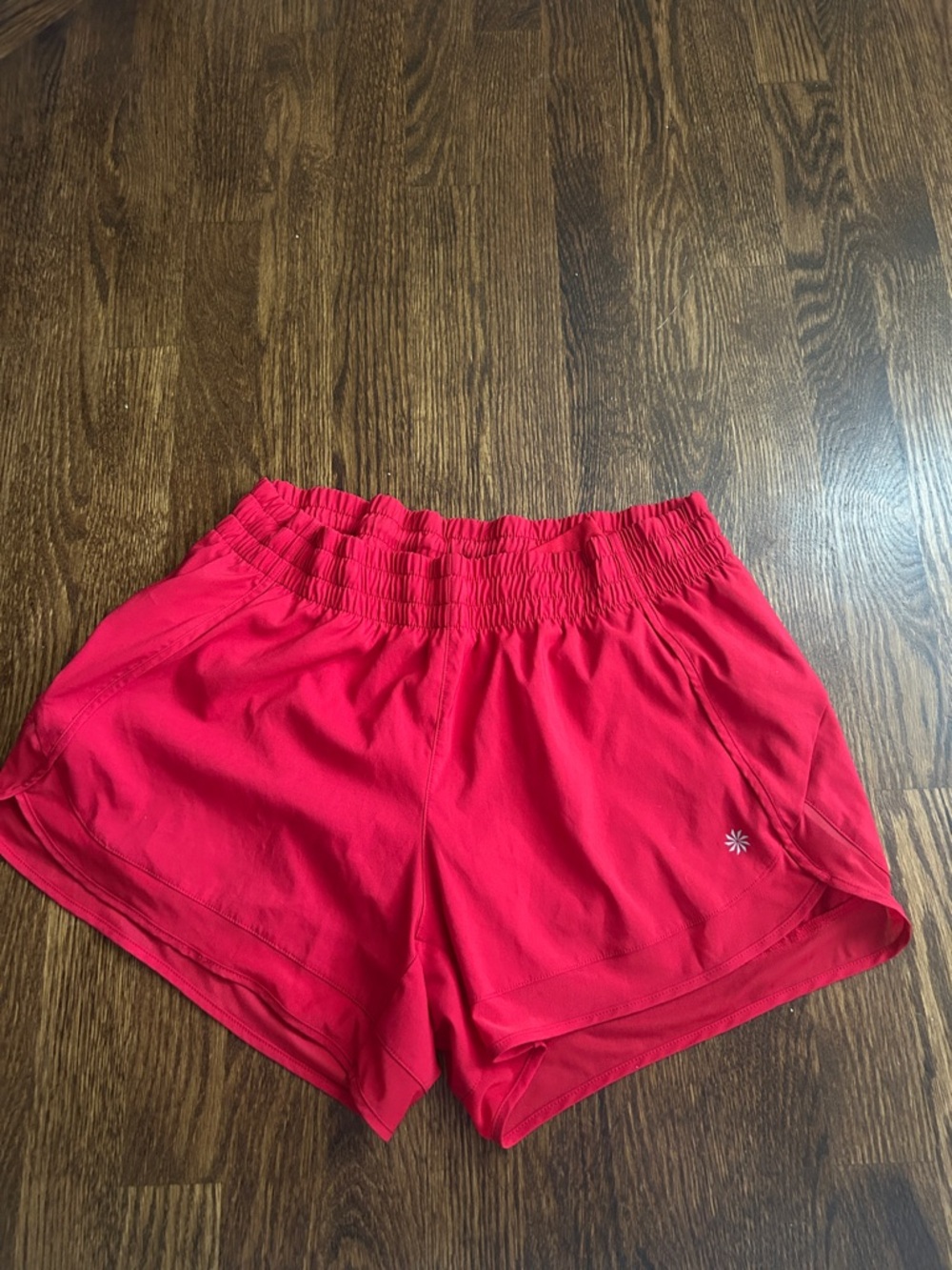 Athleta red running shorts